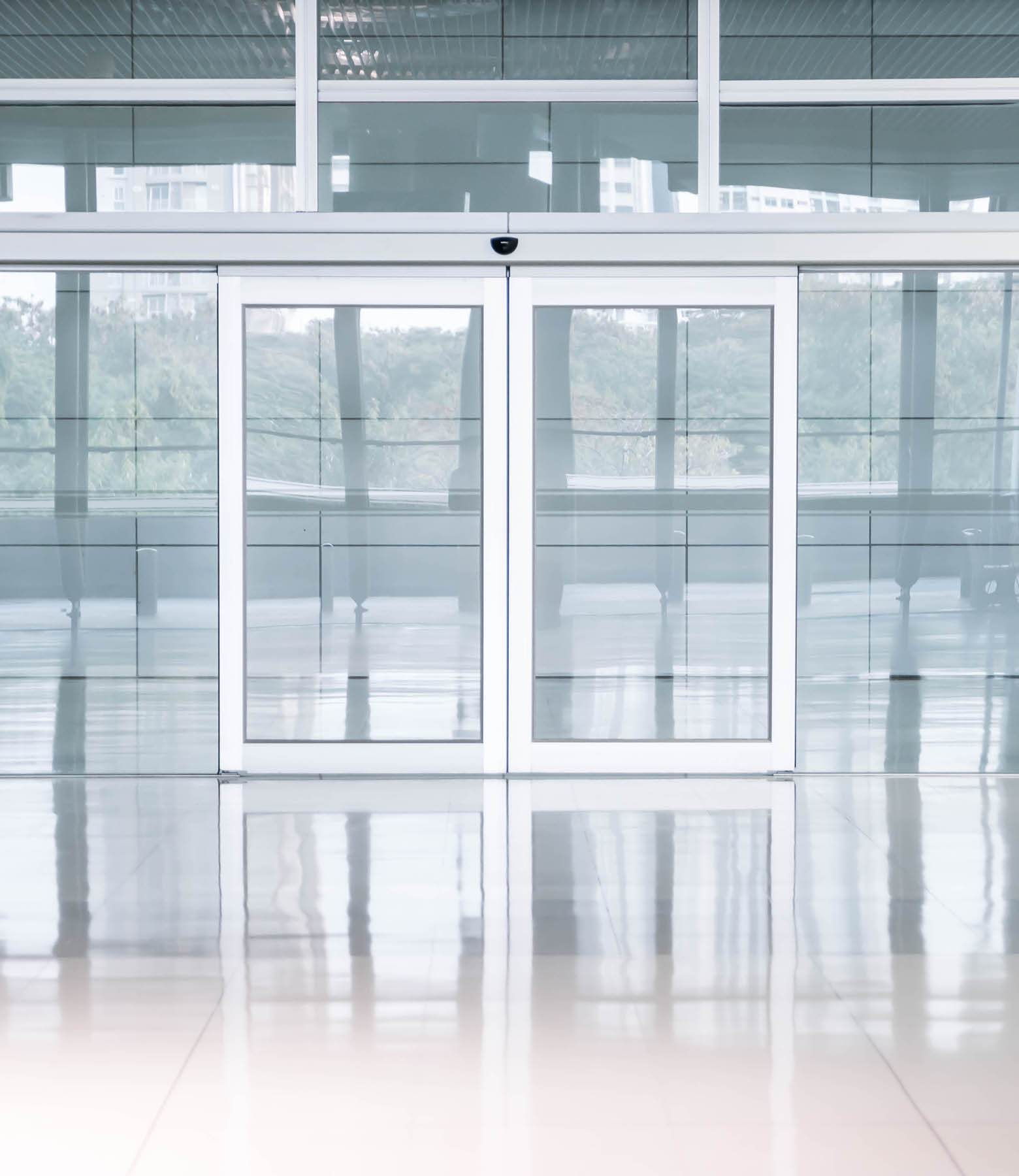 empty glass door in office building with copy space; Shutterstock ID 1049907707; purchase_order: -; name: -; client: -